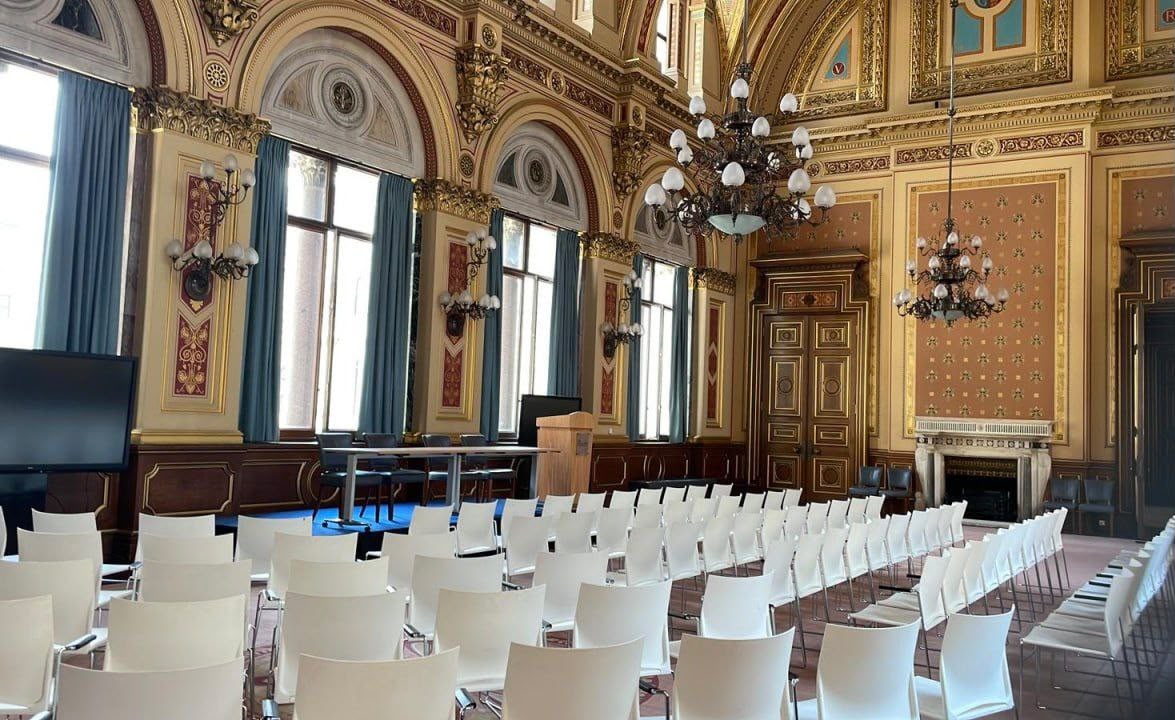 A formal conference room prepared for a ministerial study visit
